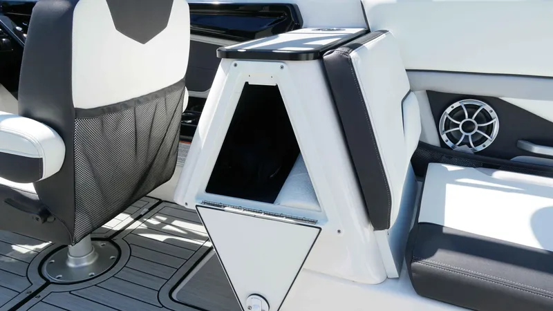 Slide: The Image of Interior of 2021 Yamaha Boats 252SD, featuring seating and storage compartment. - 19