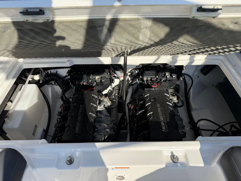 Slide: The Image of 2021 Yamaha Boats 252SD engine compartment with dual high-output engines. - 21