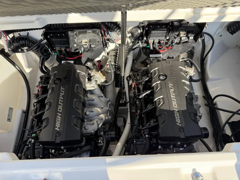 Slide: The Image of 2021 Yamaha Boats 252SD engine compartment with dual high-output engines. - 22
