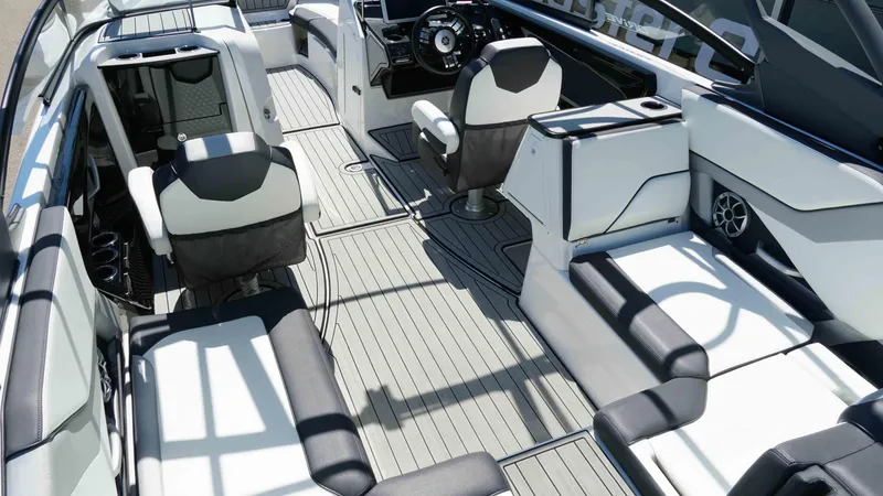 Slide: The Image of 2021 Yamaha Boats 252SD interior with sleek seating and modern design. - 6