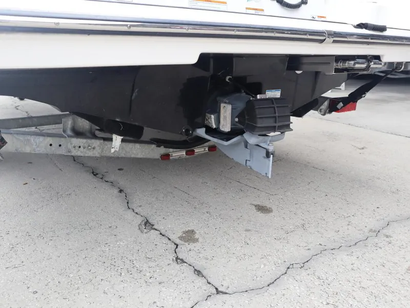 Slide: The Image of 2019 Yamaha SX195 boat trailer hitch and hull detail on concrete surface. - 4
