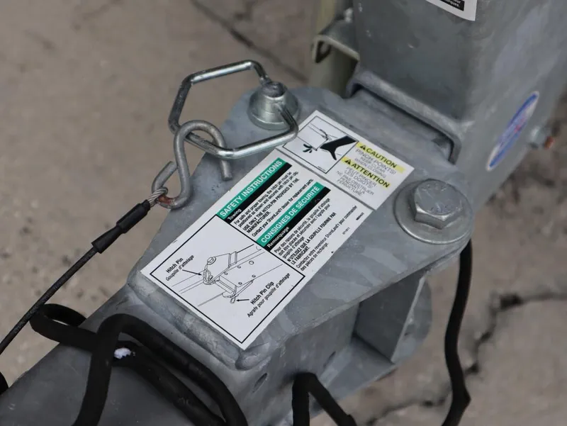 Slide: The Image of Trailer hitch with safety instructions for 2019 Yamaha Boats SX195. - 9