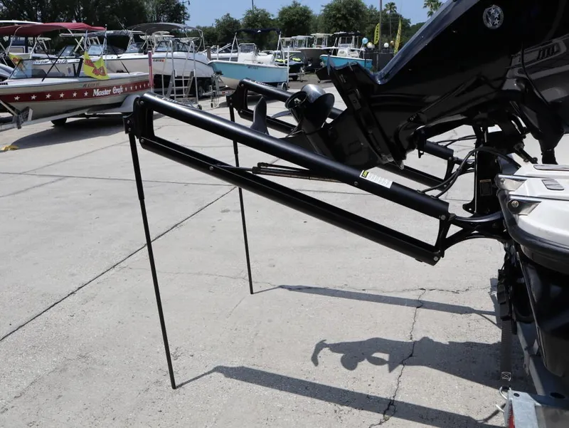 Slide: The Image of 2023 Bayliner Element M17 boat with extended motor mount in a marina. - 6