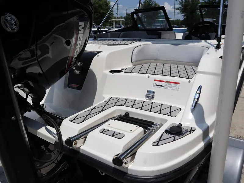 Slide: The Image of 2023 Bayliner Element M17 boat with Mercury engine, featuring sleek seating and modern design. - 7
