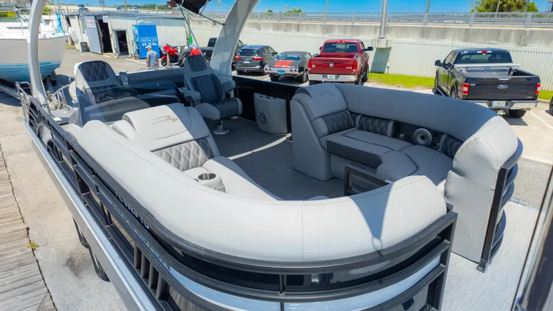 Slide: The Image of 2022 Bennington 24 LXSBA pontoon boat with luxurious seating and modern design. - 4