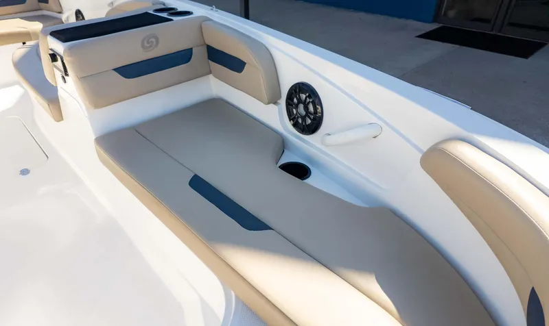 Slide: The Image of 2022 Hurricane SS185 boat interior with beige seating and built-in speaker. - 12