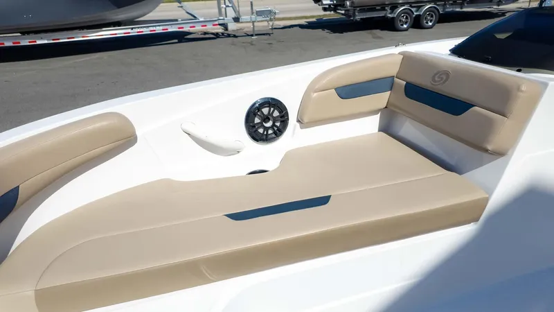Slide: The Image of 2022 Hurricane SS185 boat interior with beige seating and speaker. - 14