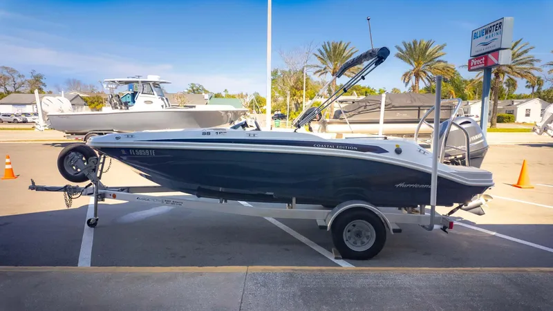 Slide: The Image of 2022 Hurricane SS185 Coastal Edition boat on trailer at dealership. - 3