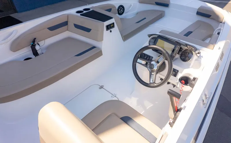 Slide: The Image of 2022 Hurricane SS185 boat interior with steering wheel and seating. - 7