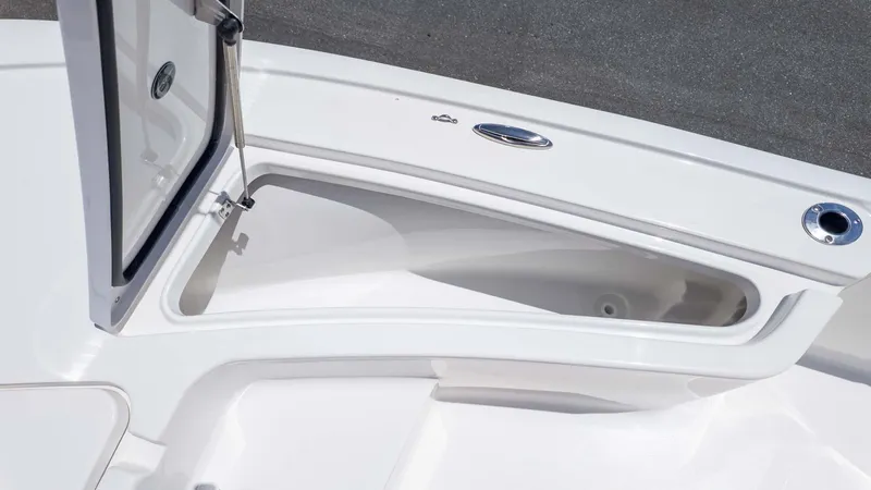 Slide: The Image of Open storage compartment on 2025 Tidewater 2110 Bay Max boat deck. - 13