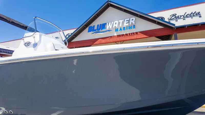 Slide: The Image of 2025 Tidewater 2110 Bay Max boat at Bluewater Marine dealership. - 3