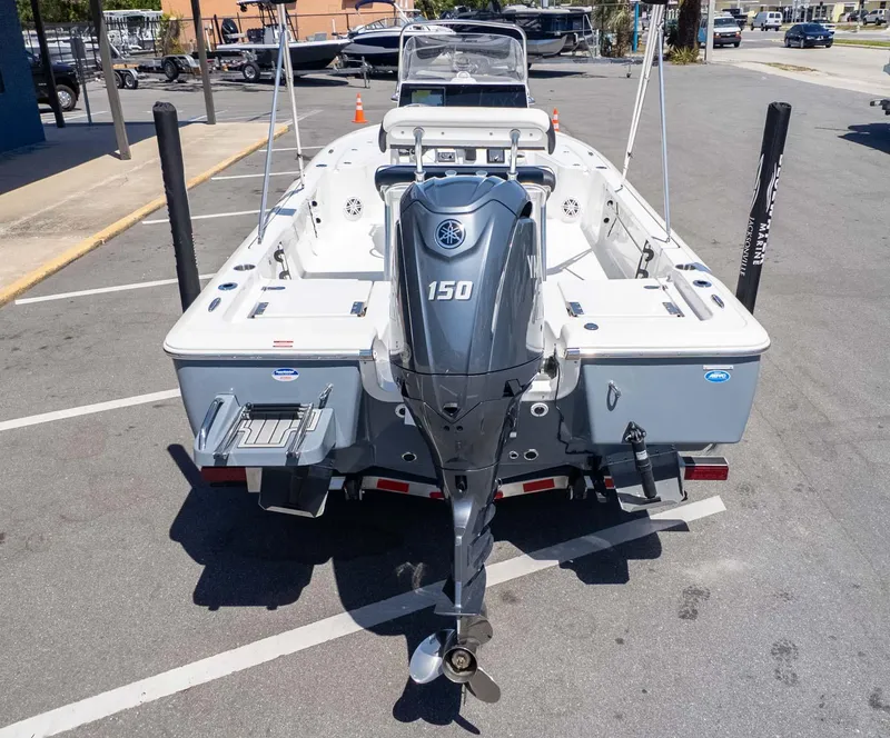 Slide: The Image of 2025 Tidewater 2110 Bay Max boat with Yamaha 150 engine, parked in a lot. - 5