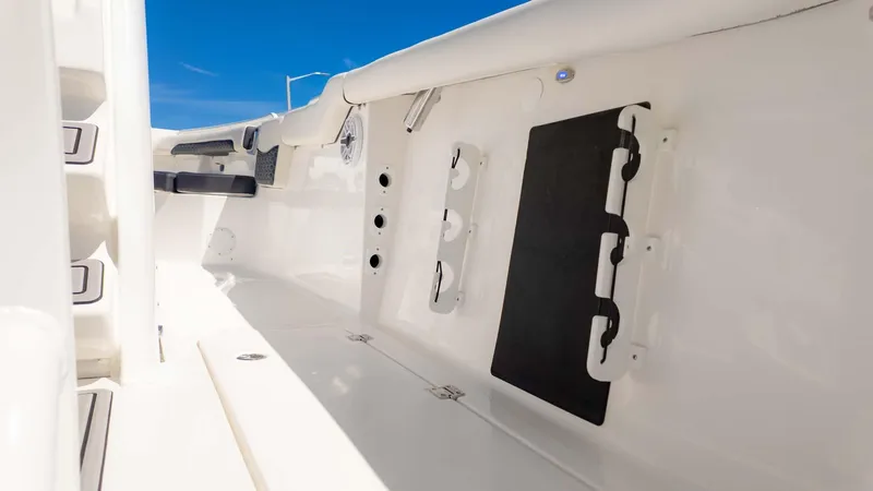 Slide: The Image of 2025 Tidewater 256CC boat interior, featuring sleek white design and modern fittings. - 15