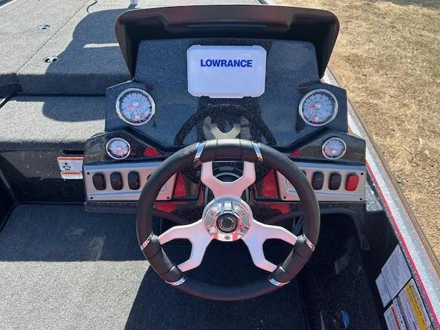 Slide: The Image of Steering console of 2025 Nitro Z19 boat with Lowrance display and gauges. - 13