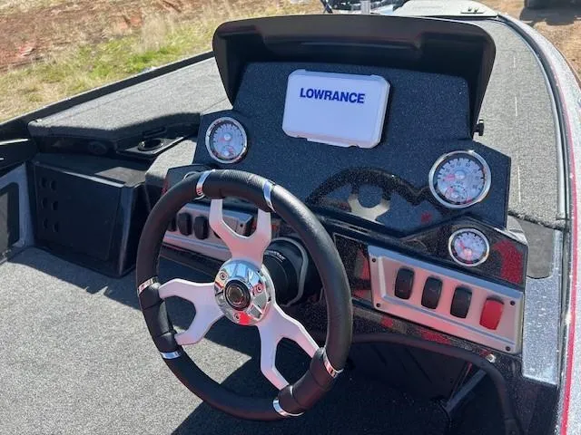 Slide: The Image of Steering console of 2025 Nitro Z19 boat with Lowrance display and gauges. - 14