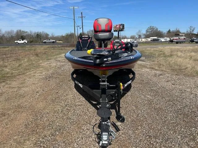 Slide: The Image of 2025 Nitro Z19 boat on trailer in outdoor setting. - 19