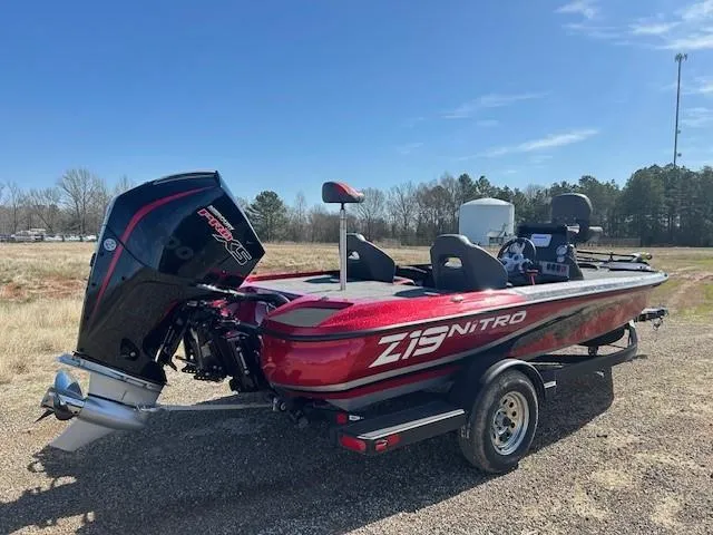 Slide: The Image of 2025 Nitro Z19 boat with powerful engine, parked outdoors on a sunny day. - 6