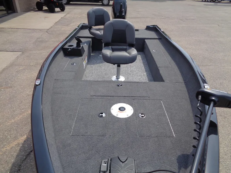 Slide: The Image of 2025 Tracker Super Guide V-16 T fishing boat with seating and storage compartments. - 9