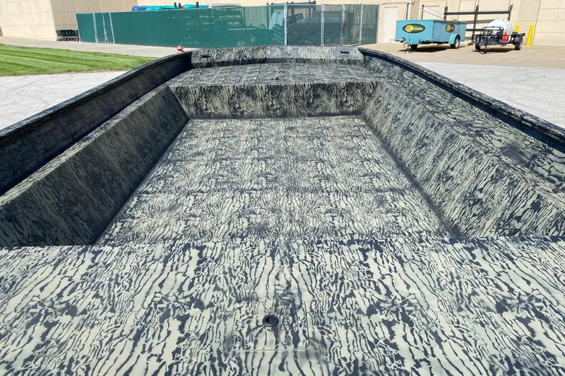 Slide: The Image of 2025 Tracker GRIZZLY 2072 Utility boat with camouflage interior design. - 2