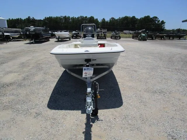 Slide: The Image of 2023 Mako Pro Skiff 17 CC boat on trailer in outdoor lot. - 9