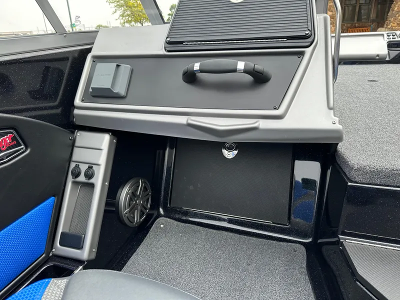 Slide: The Image of Interior of 2025 Ranger 2080MS boat, featuring sleek dashboard and modern controls. - 8