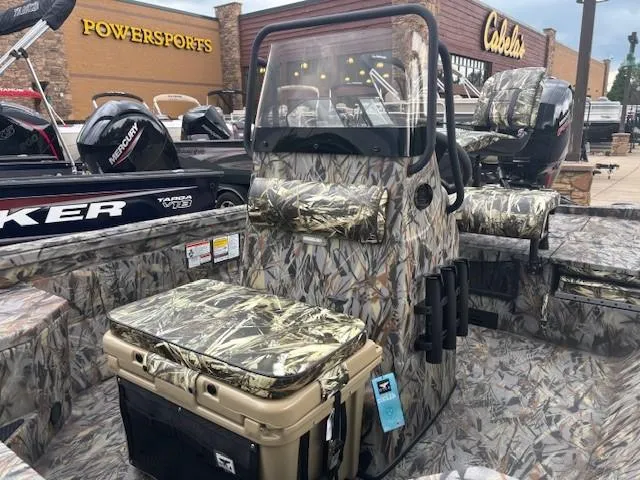 Slide: The Image of 2025 Ranger RB200 boat with camouflage design, displayed at a Powersports store. - 3