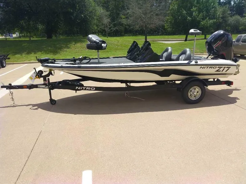 Slide: The Image of 2025 Nitro Z17 boat on trailer in sunny outdoor setting. - 3