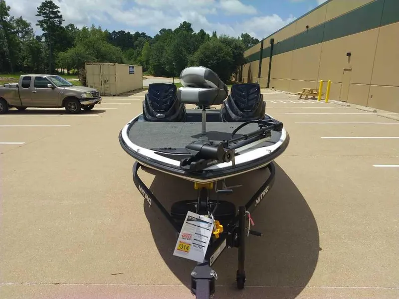 Slide: The Image of 2025 Nitro Z17 boat in parking lot, featuring sleek design and modern equipment. - 9