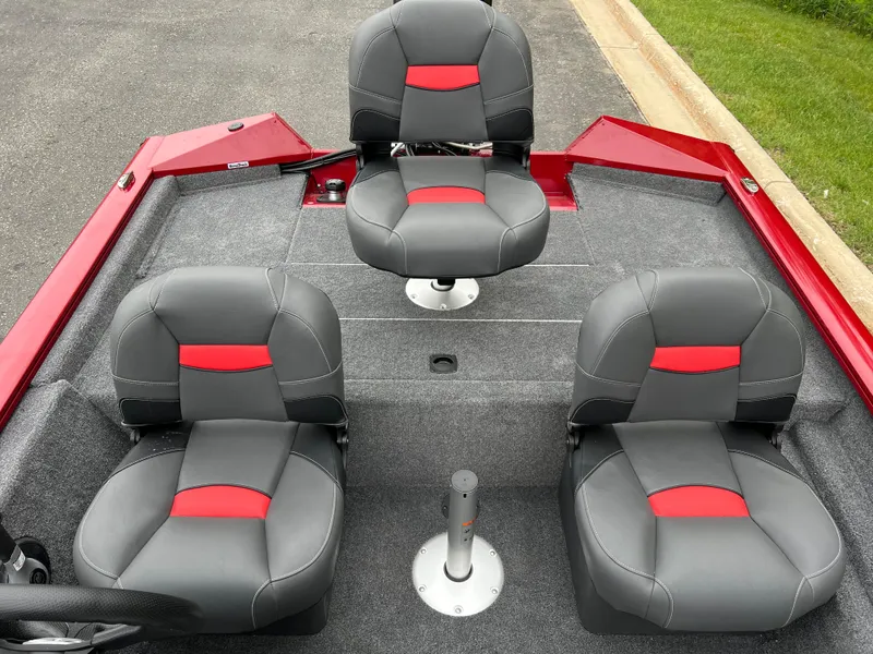 Slide: The Image of 2025 Tracker Pro Team 175 Crappie Edition boat with gray and red seating. - 6