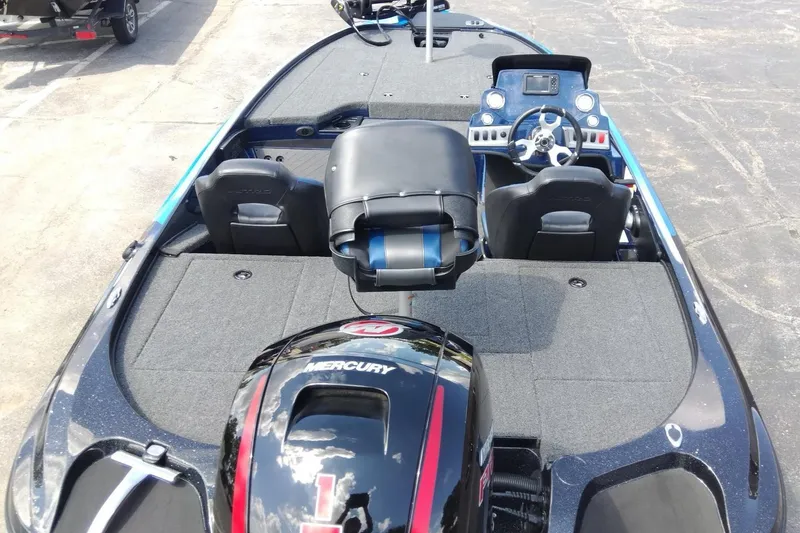 Slide: The Image of 2025 Nitro Z18 boat interior with Mercury engine, featuring dual seats and steering console. - 8