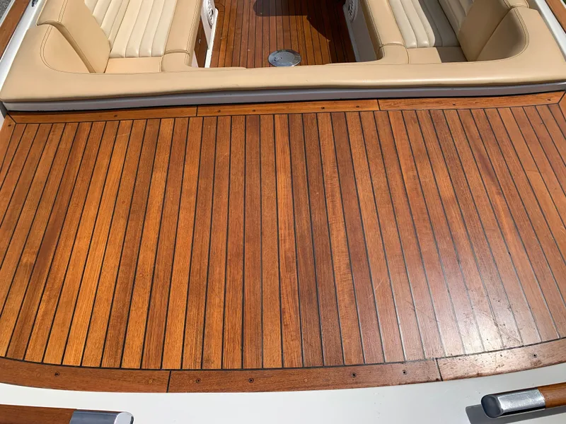 Slide: The Image of Teak deck of 2012 Chris-Craft Launch 28 with beige seating. - 12
