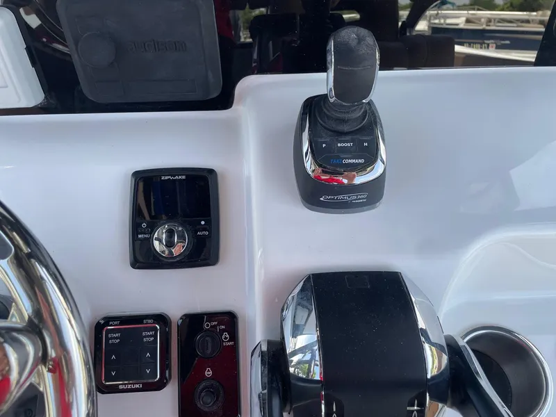 Slide: The Image of Control panel of 2025 Sea Pro 292 Offshore boat with modern navigation equipment. - 11