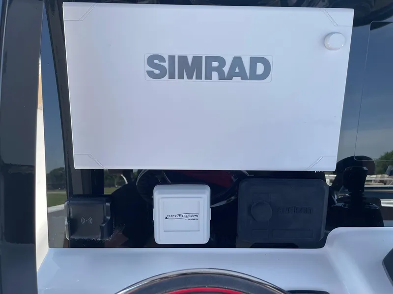 Slide: The Image of 2025 Sea Pro 292 Offshore dashboard featuring Simrad electronics. - 10