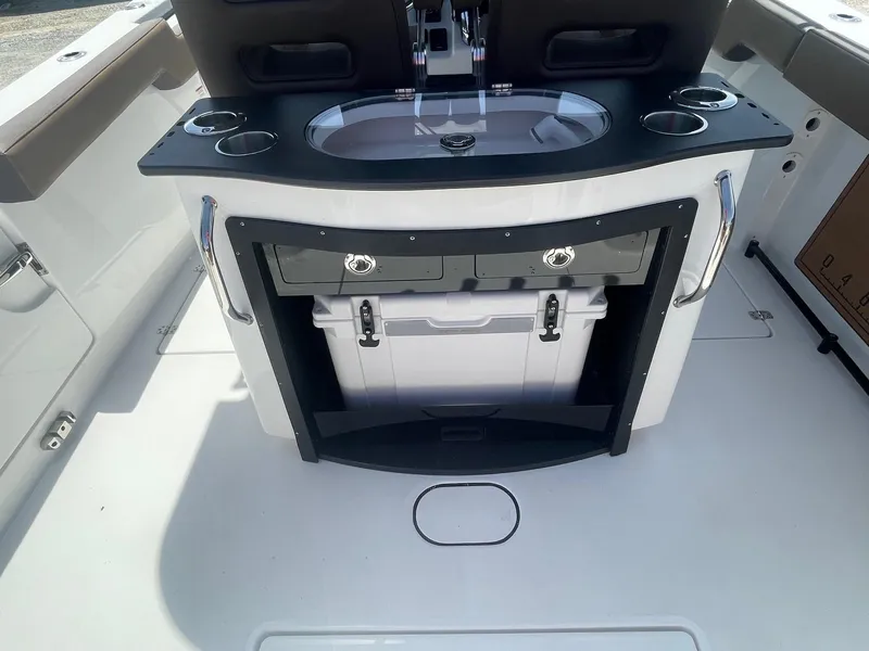 Slide: The Image of 2025 Sea Pro 292 Offshore boat interior with sink and storage area. - 14