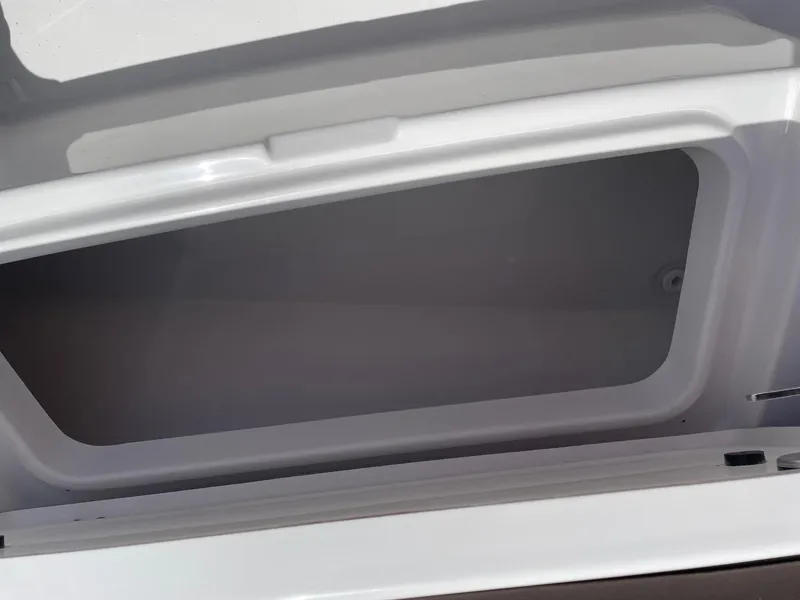 Slide: The Image of Open storage compartment on a 2025 Sea Pro 292 Offshore boat. - 19