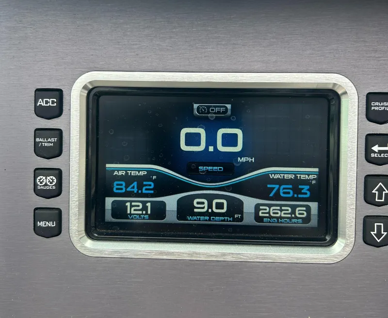Slide: The Image of Dashboard display of a 2018 MasterCraft XT23 showing speed, temperature, and engine hours. - 13