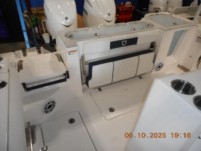Slide: The Image of 2025 Sea Fox 328 Commander boat interior with seating and storage features. - 14