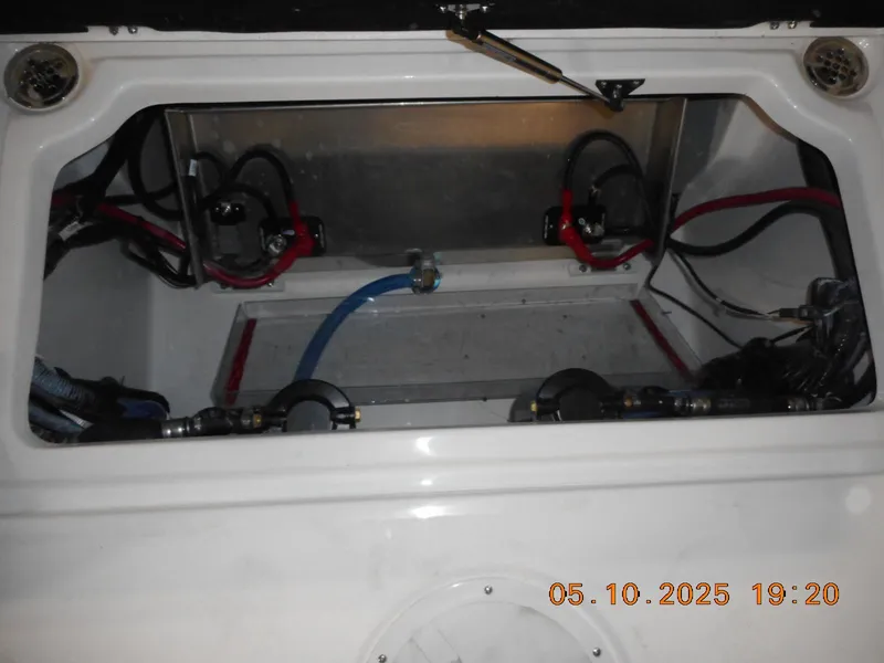 Slide: The Image of Engine compartment of a 2025 Sea Fox 328 Commander boat, showing wiring and components. - 28