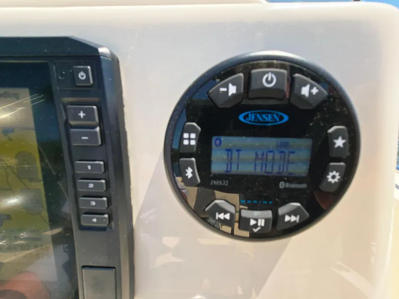 Slide: The Image of Control panel of 2023 Grady-White Fisherman 180 boat with Jensen audio system. - 11