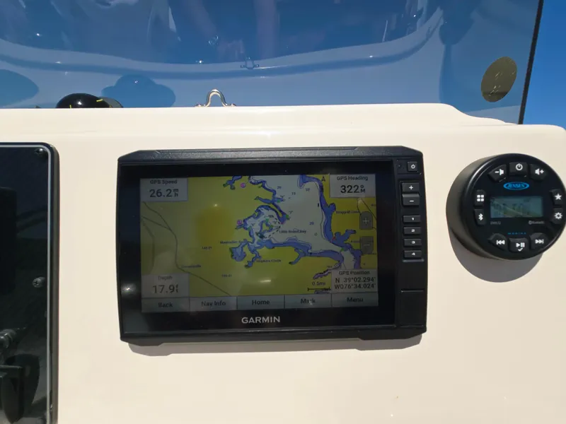 Slide: The Image of Garmin GPS display on 2023 Grady-White Fisherman 180 boat dashboard. - 18