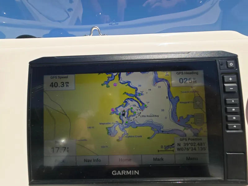 Slide: The Image of Garmin GPS display on 2023 Grady-White Fisherman 180, showing speed and navigation map. - 20