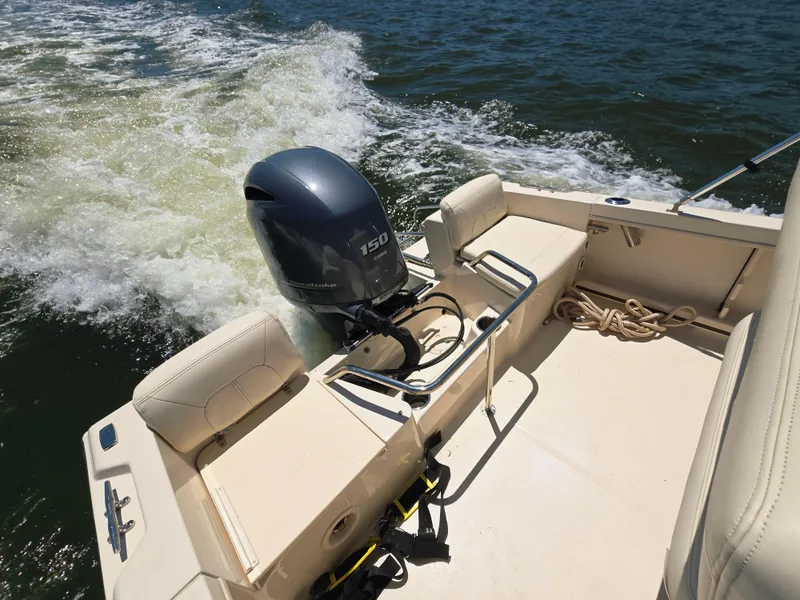 Slide: The Image of 2023 Grady-White Fisherman 180 boat with powerful outboard motor on open water. - 23