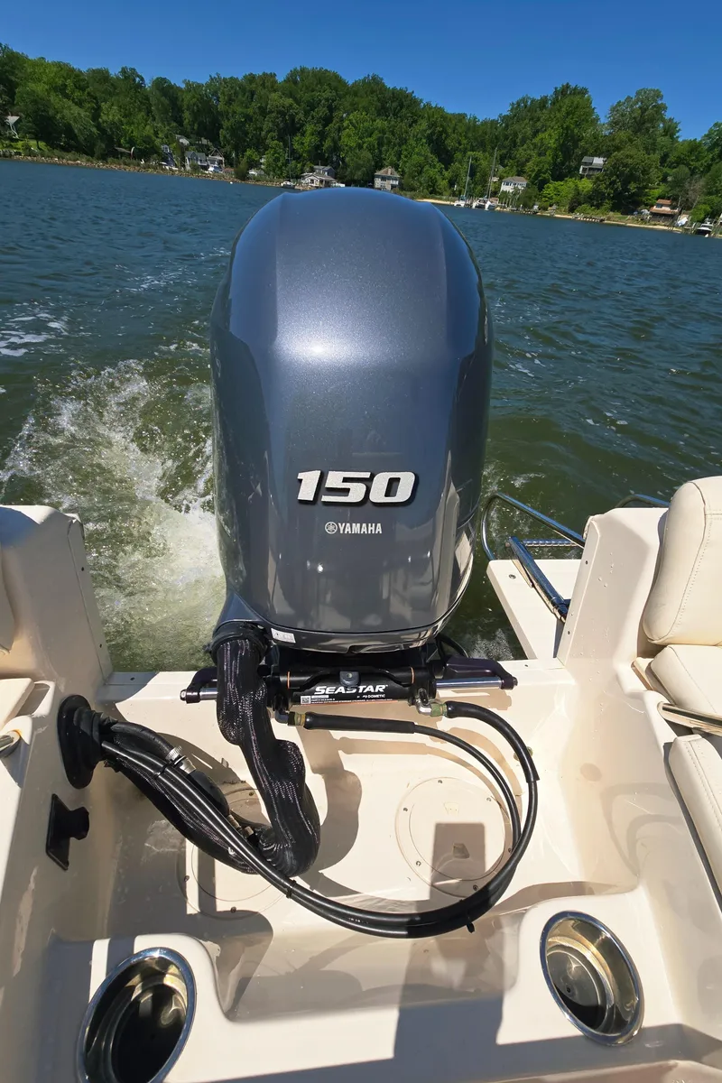 Slide: The Image of 2023 Grady-White Fisherman 180 boat with Yamaha 150 engine on a lake. - 27