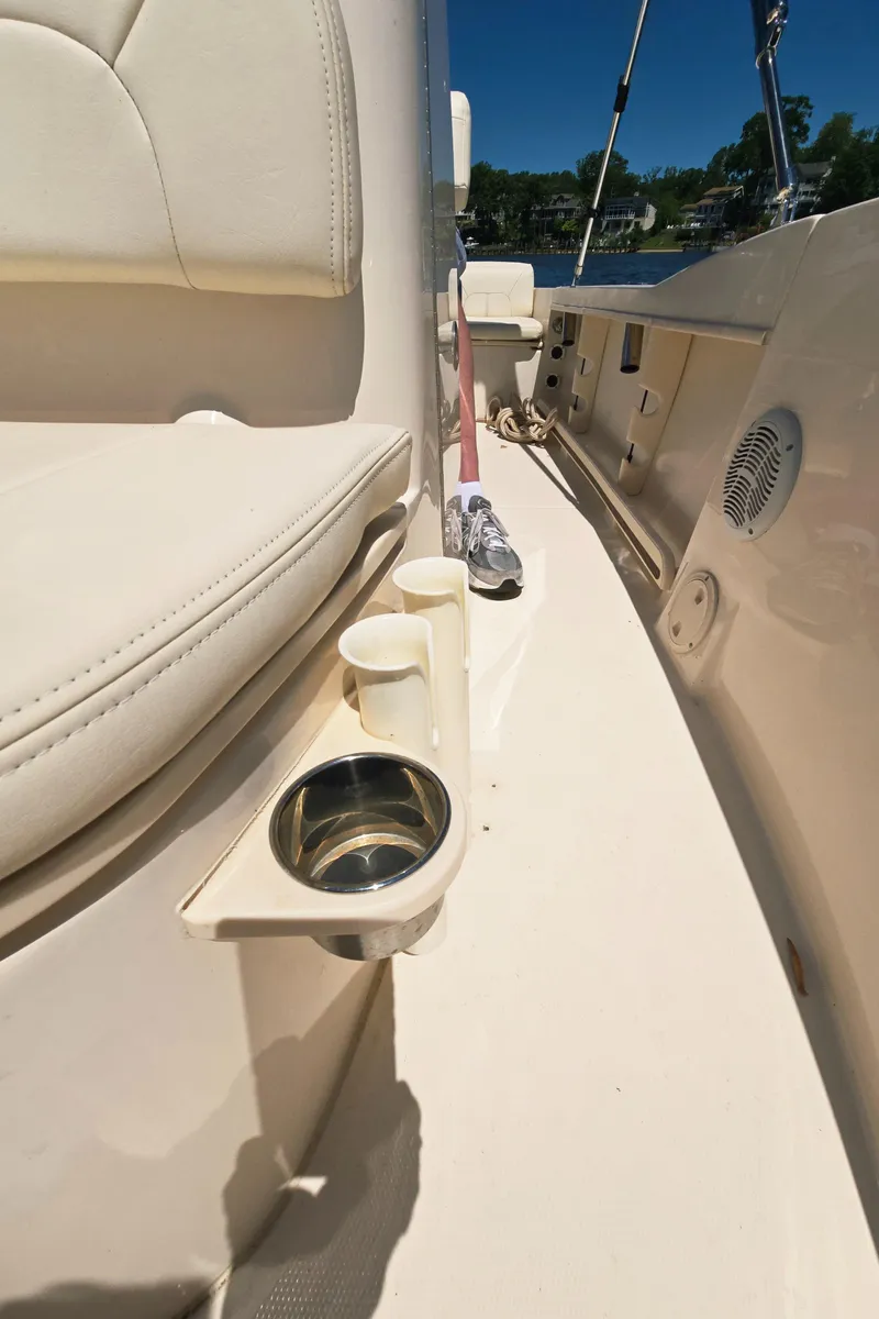 Slide: The Image of 2023 Grady-White Fisherman 180 boat interior with cup holders and seating. - 32