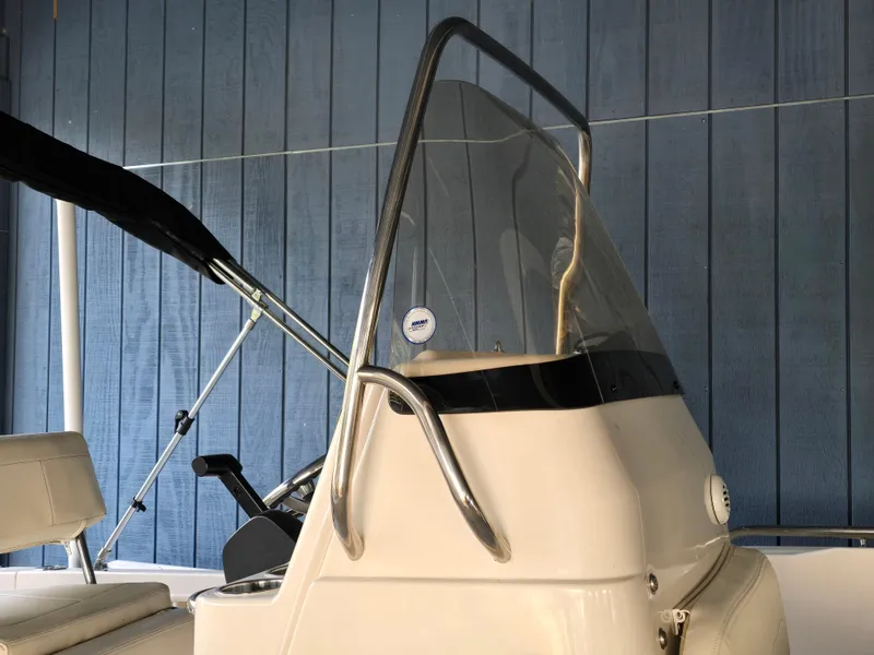 Slide: The Image of 2023 Grady-White Fisherman 180 boat console with windshield and seating. - 42