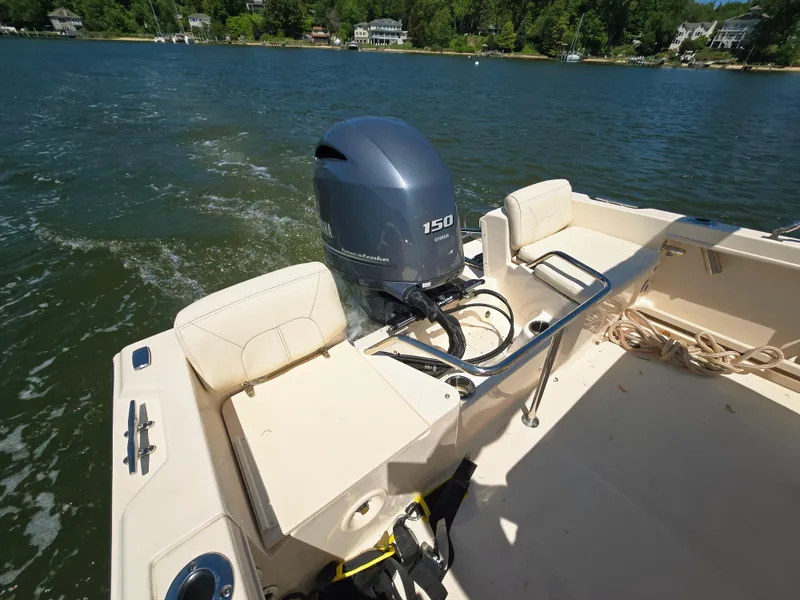 Slide: The Image of 2023 Grady-White Fisherman 180 boat with powerful outboard motor on a scenic lake. - 7