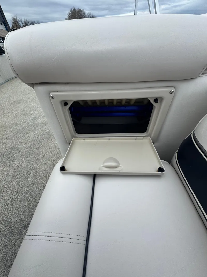 Slide: The Image of 2007 Premier Grand Majestic 22 boat seat with open storage compartment. - 11