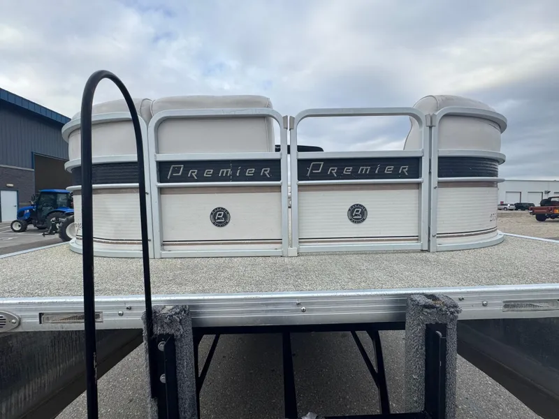 Slide: The Image of 2007 Premier Grand Majestic 22 pontoon boat on trailer, overcast sky background. - 4