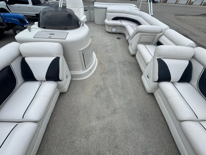 Slide: The Image of Luxurious seating on a 2007 Premier Grand Majestic 22 pontoon boat interior. - 7