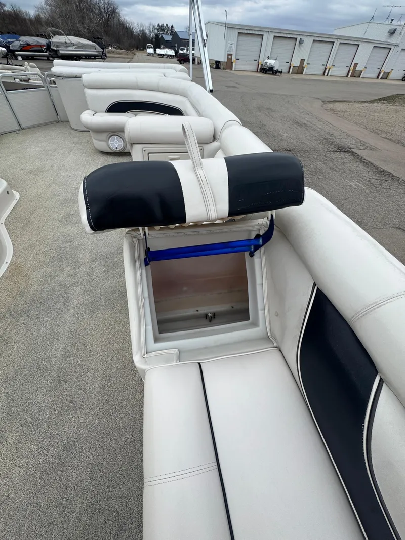 Slide: The Image of 2007 Premier Grand Majestic 22 boat with open storage compartment on deck. - 9